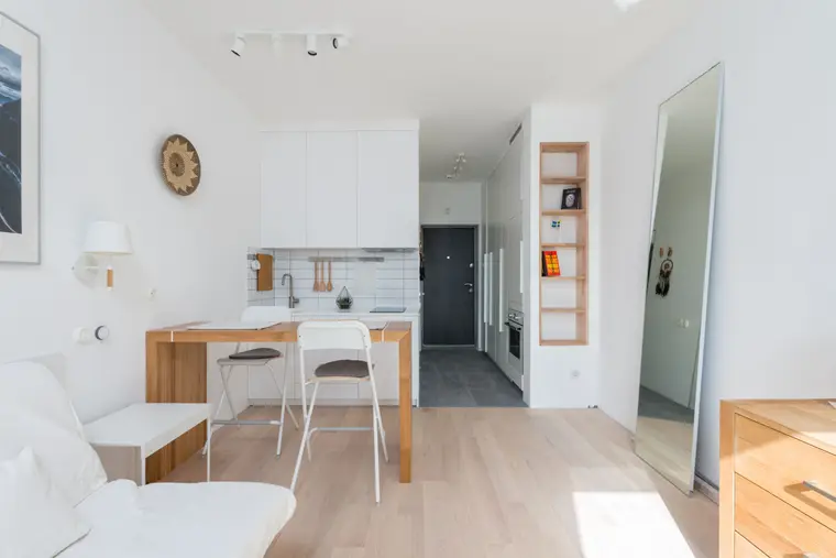 Open-plan kitchen and living area with a continuous floor throughout